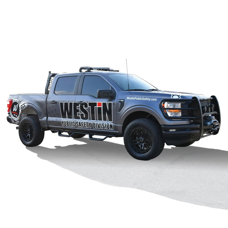 Side view of a Westin truck featuring Outlaw Nerf Step Bars, reflecting a bold and functional design.
