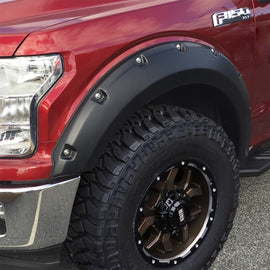 Close-up of Bushwacker Pocket Style Flares for 2018-2020 Ford F-150 in Agate Black Met highlighting unique features and wheel protection.