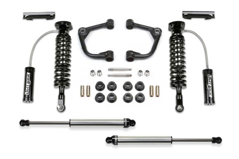 Fabtech 15-20 Ford F150 4WD 2in Uniball UCA System featuring Dirt Logic coilovers, upper control arms, and shock components, designed for off-road performance and enhanced durability.