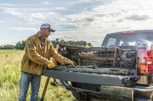 Load image into Gallery viewer, Roll-N-Lock 08-16 Ford F-250/F-350 Super Duty SB 80-1/4in Cargo Manager