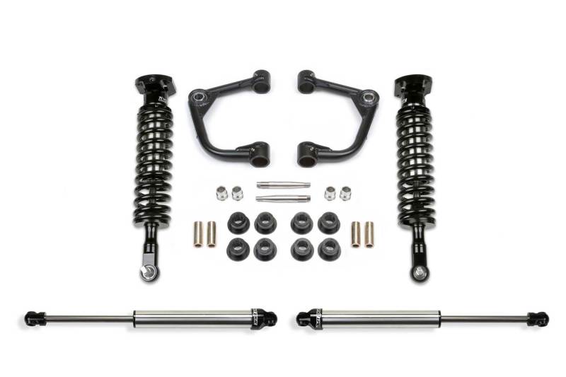 Fabtech 15-20 Ford F150 2WD 2in Uniball Upper Control Arm System with coilover shocks, uniballs, and accessories for enhanced off-road performance.