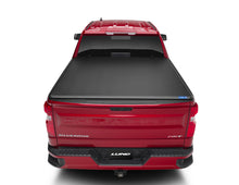 Load image into Gallery viewer, Lund 15-17 Chevy Silverado 3500 Fleetside (6.6ft. Bed) Hard Fold Tonneau Cover - Black