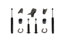 Load image into Gallery viewer, MaxTrac 09-18 RAM 1500 2WD 4in Rear Lift Kit components including shock absorbers and mounting hardware, designed for performance and durability by Maxtrac.