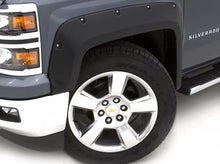 Load image into Gallery viewer, Lund 15-17 Chevy Silverado 2500 RX-Rivet Style Textured Elite Series Fender Flares - Black (4 Pc.)