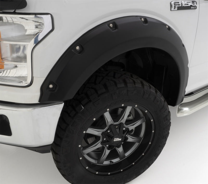 Detailed view of the Bushwacker Pocket Style Fender Flares on a Ford F-150, illustrating the stylish edge trim and sturdy material.