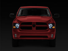 Load image into Gallery viewer, Raxiom 09-18 RAM 1500 Super White LED Halo Projector Headlights- Black Housing (Clear Lens)