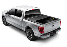 Load image into Gallery viewer, Roll-N-Lock 15-17 Ford F-150 77-3/8in E-Series Retractable Tonneau Cover