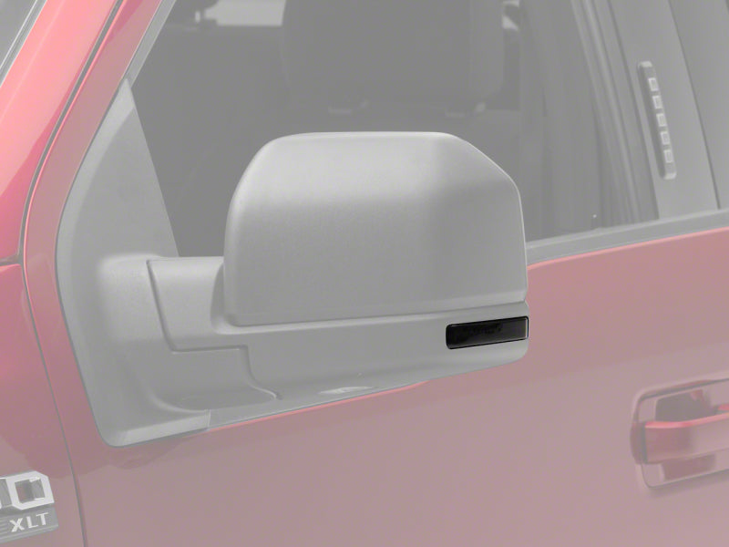 Raxiom Axial Series LED Mirror Mounted Turn Signals for 15-20 Ford F-150 displayed on a vehicle, featuring a sleek smoked lens design.