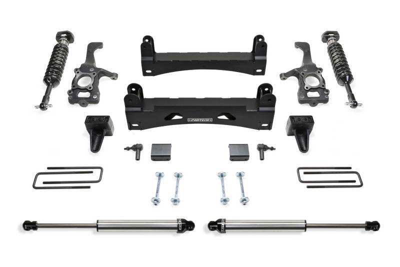 Fabtech 15-20 Ford F150 2WD 6in Performance System parts laid out, showcasing components like coilovers, crossmembers, and hardware for easy installation.